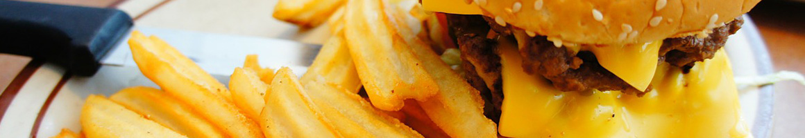 Eating American (Traditional) Burger Pub Food at Louie's Grill & Bar restaurant in Yukon, OK.